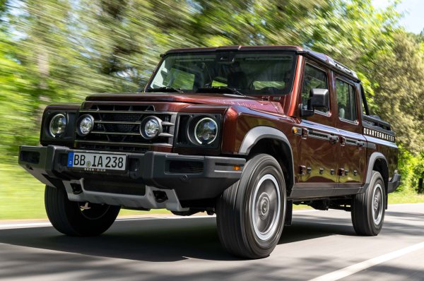 Плюсове - много добра проходимост, солиден, здрав и безкрайно практичен, мощни двигатели.
Минуси - неудобни задни седалки, по-скъп от съперниците с двойна кабина, товарен отсек с едва 835 кг.
Grenadier Quartermaster се намира в по-скъпия край на пикап сегмента, базиран на своя братовчед SUV . 
Quartermaster е с 305 mm по-дълъг от Grenadier Station Wagon, което му осигурява товарен отсек с размери 1564 mm на 1619 mm – достатъчно, за да побере европалет. Капацитетът за теглене и полезен товар на Quartermaster е изравнен повече с този на петместен 4x4, отколкото на пикап. Теглителната сила стига за 3.5 тона, но може да носи само 835 кг в товарния отсек.
Имате избор между два 3,0-литрови двигателя на BMW - бензинов или дизелов. И двата са съчетани с осемстепенна автоматична скоростна кутия и задвижване на четирите колела. Двигателите са плавни, отзивчиви и с характер.  Извън пътя, Quartermaster е изключително способен, с отличен клиренс и способности за газене. Неговото шаси е малко от старата школа на пътя, но достатъчно добро. 